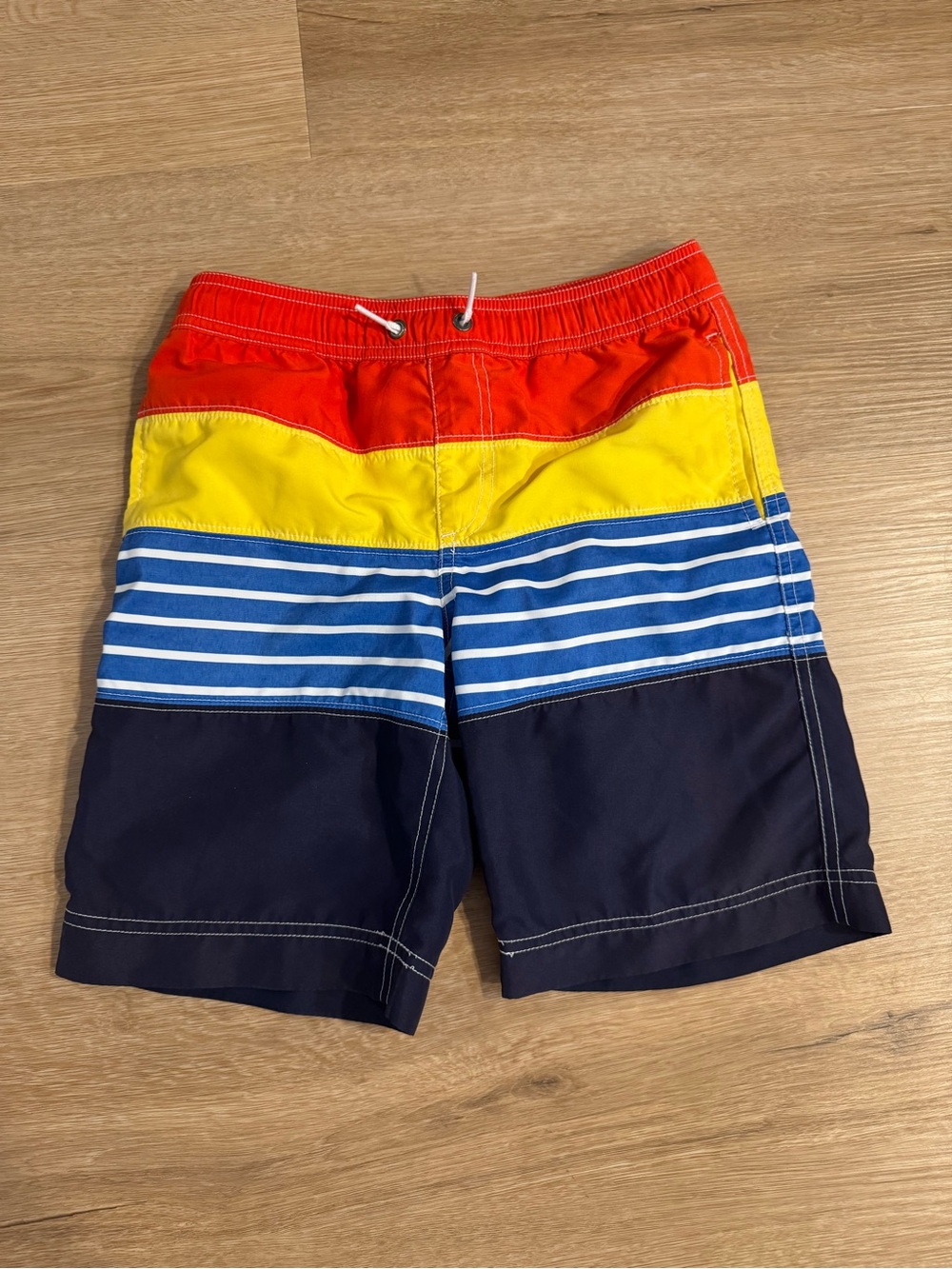 Hanna Andersson Red Yellow and BlueStriped Boys Swim Trunks